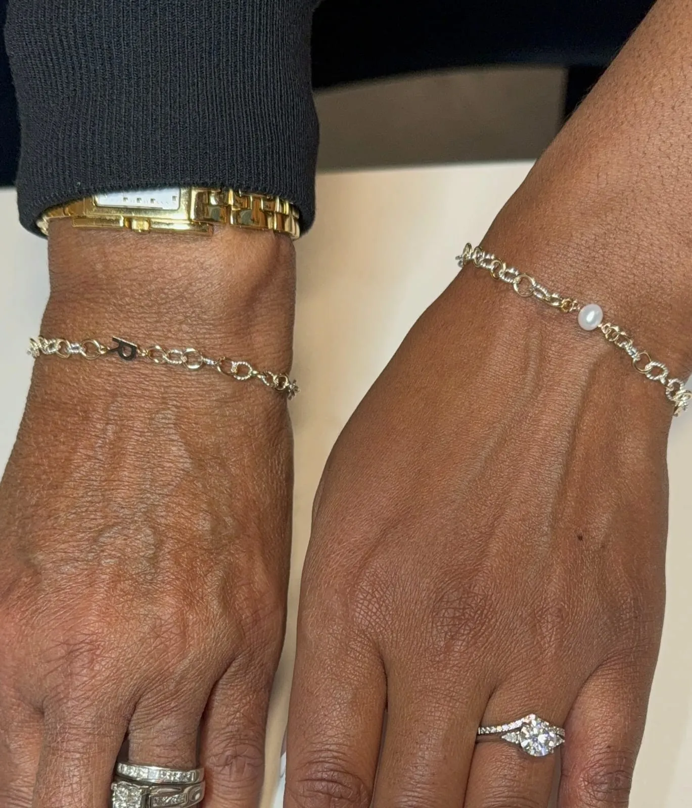 Mother and daughter with matching permanent jewelry