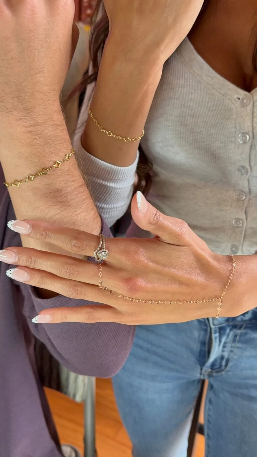 Couple with matching permanent jewelry
