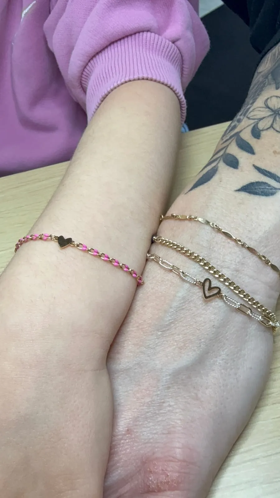 Mother and daughter with matching permanent jewelry