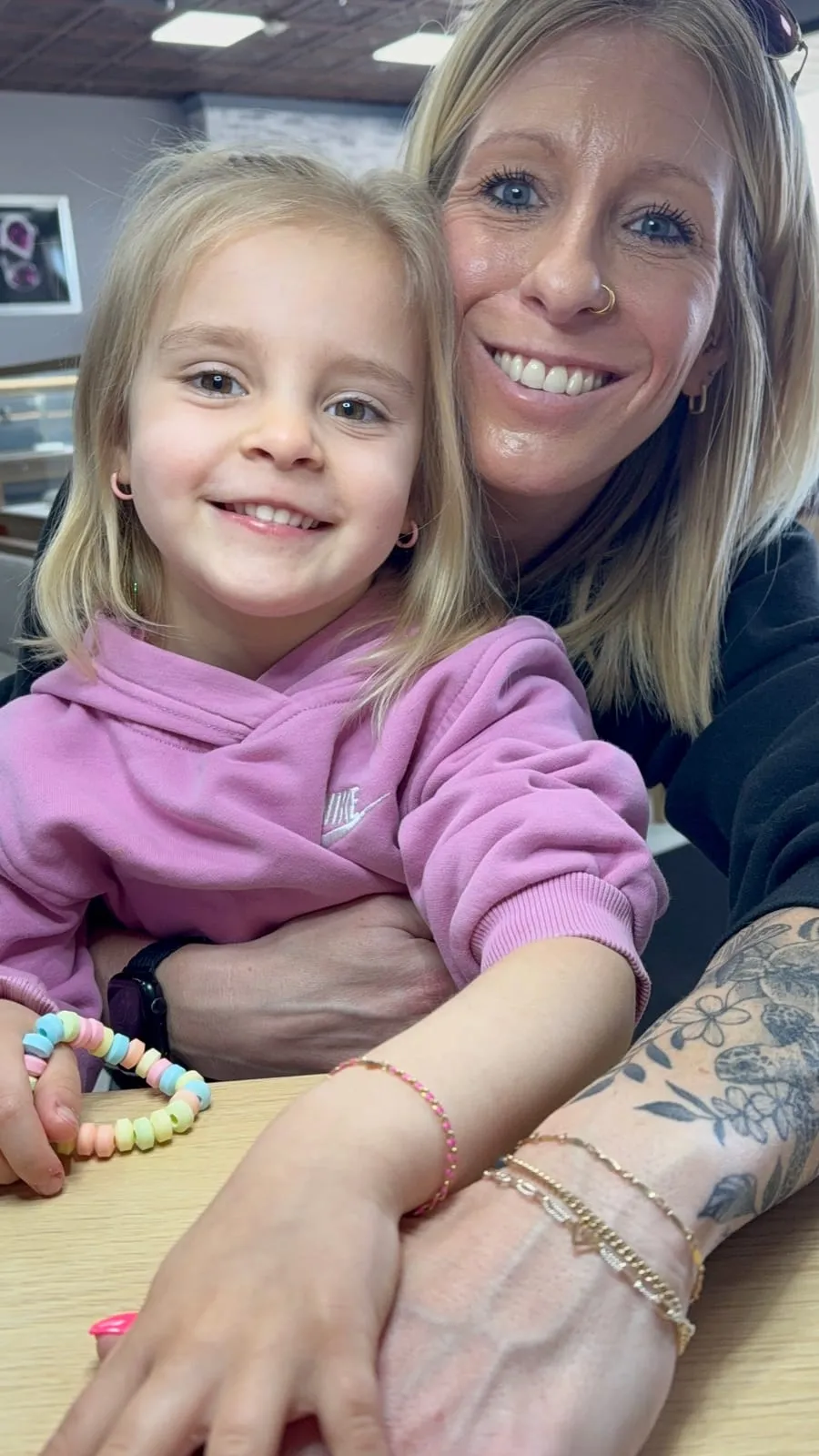 Mother and daughter with matching permanent jewelry