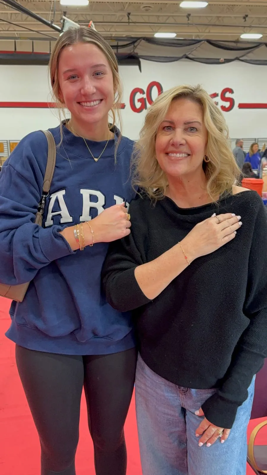 Mother and daughter with matching permanent jewelry