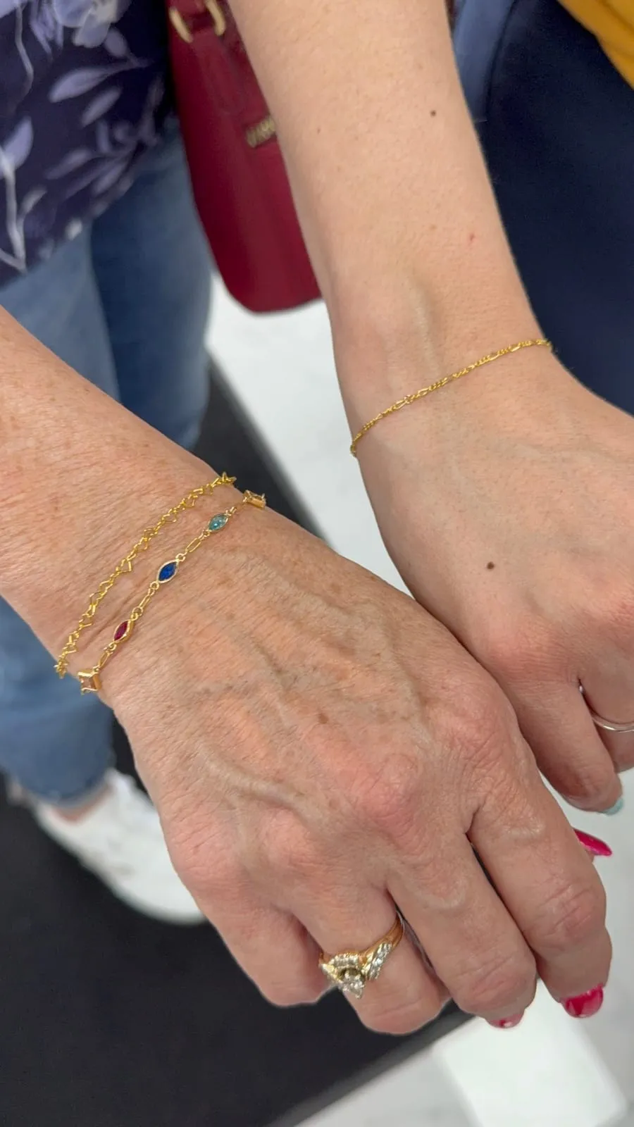 Mother and daughter with matching permanent jewelry