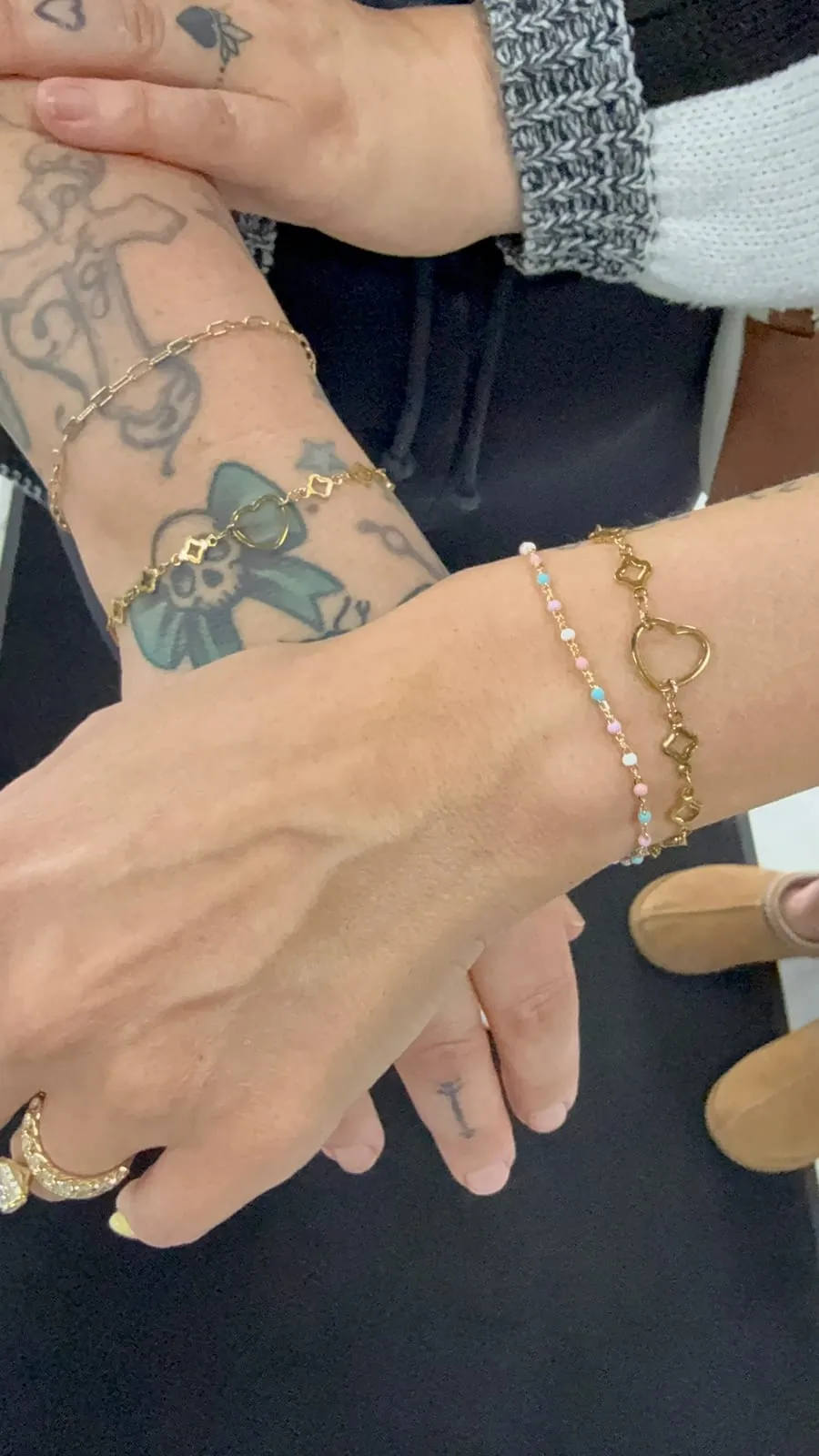 Friends with matching permanent jewelry
