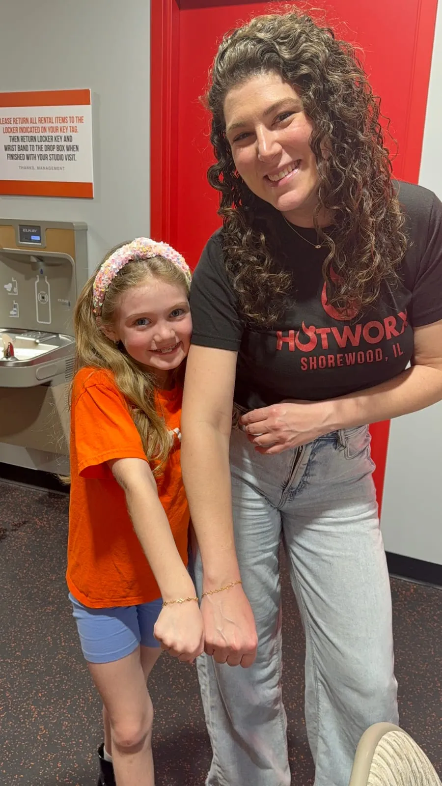 Mother and daughter with matching permanent jewelry
