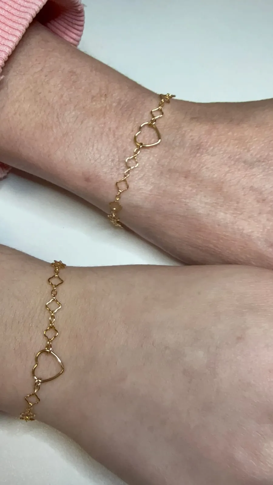 Mother and daughter with matching permanent jewelry