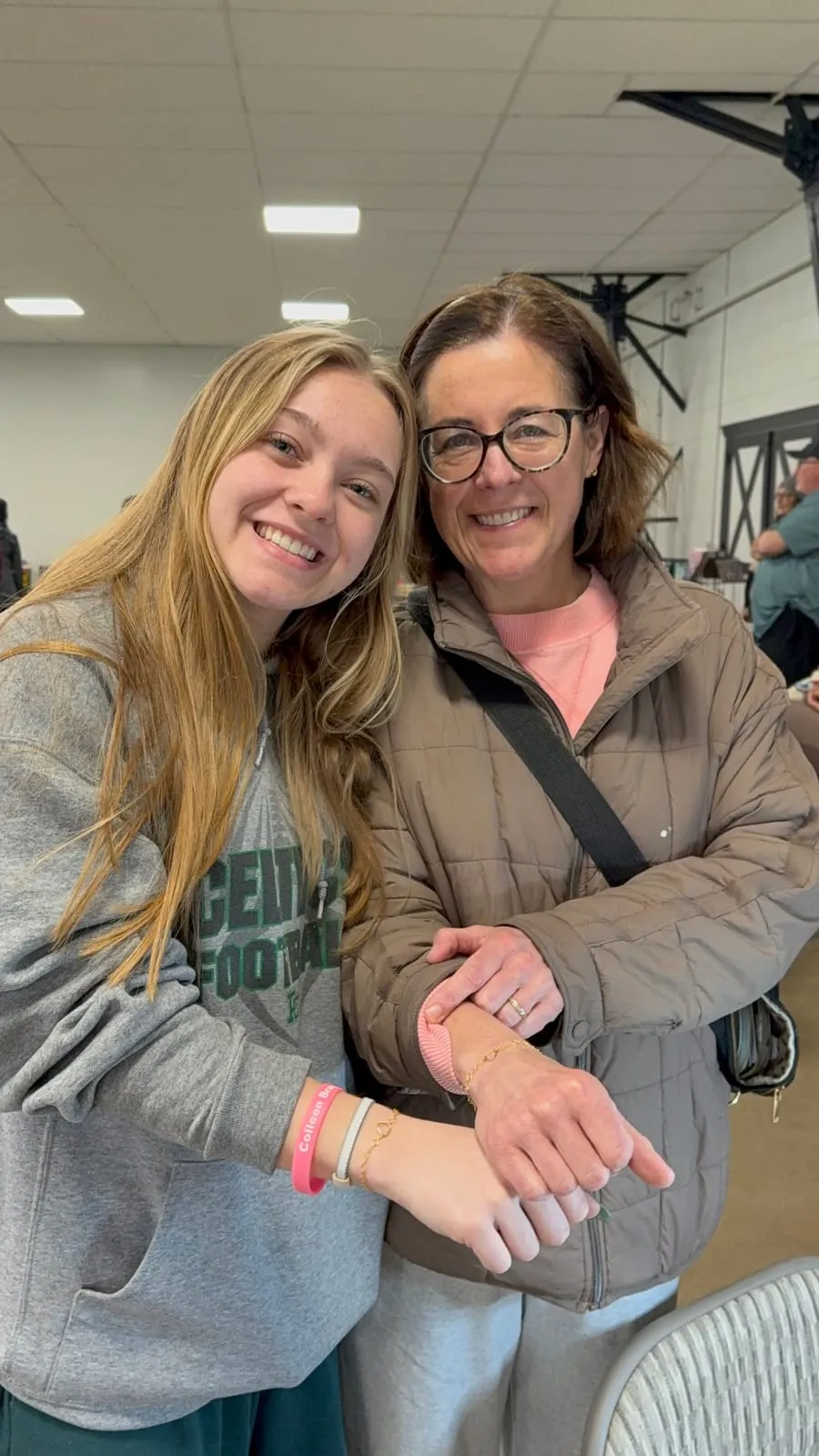 Mother and daughter with matching permanent jewelry