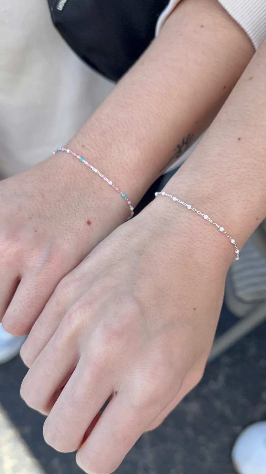 Friends with matching permanent jewelry