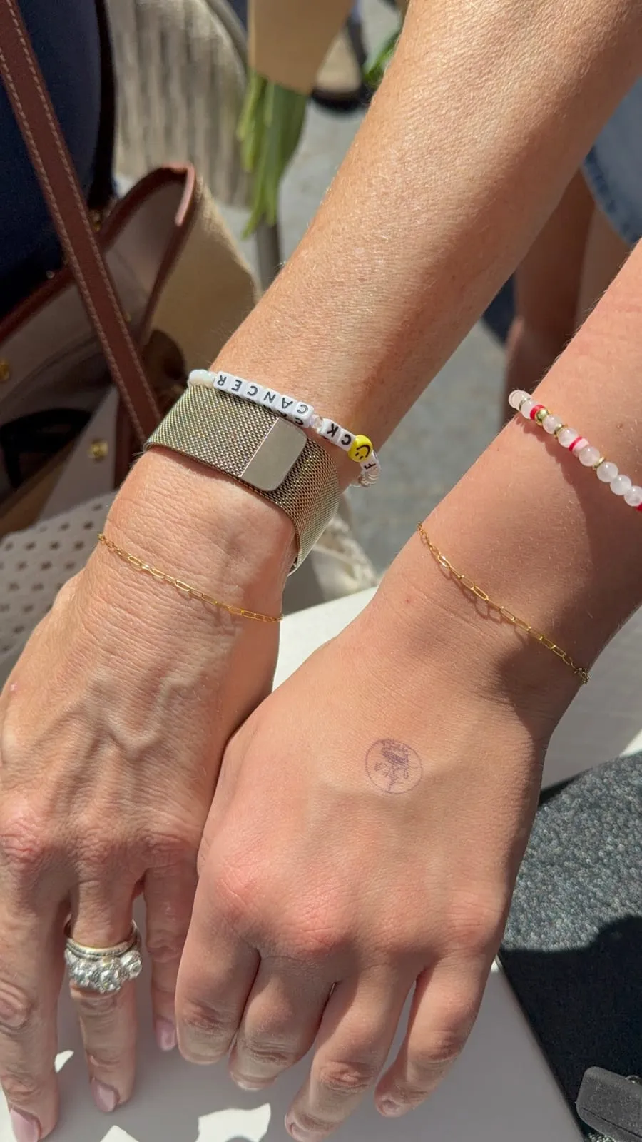 Mother and daughter with matching permanent jewelry