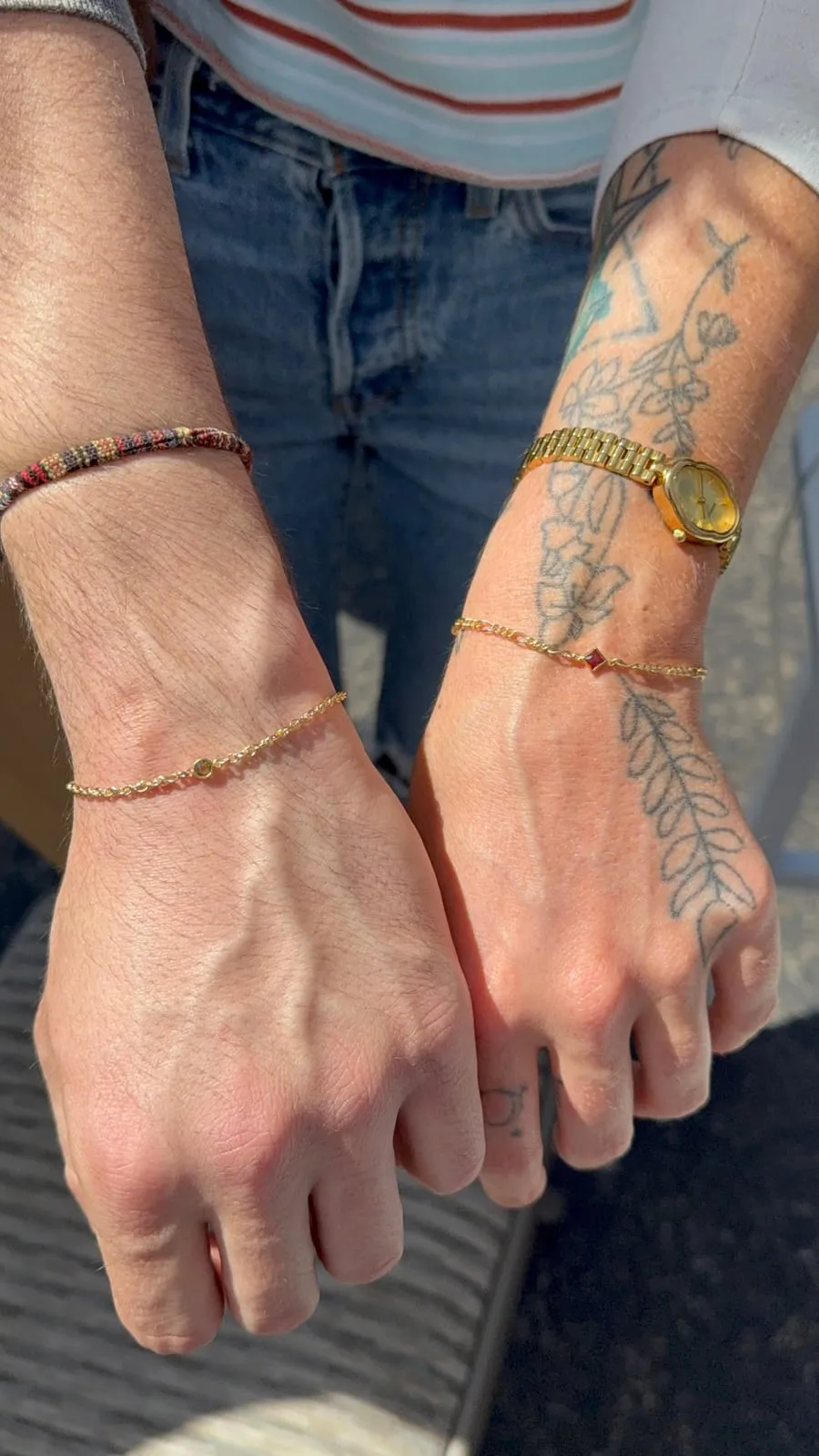 Couple with matching permanent jewelry