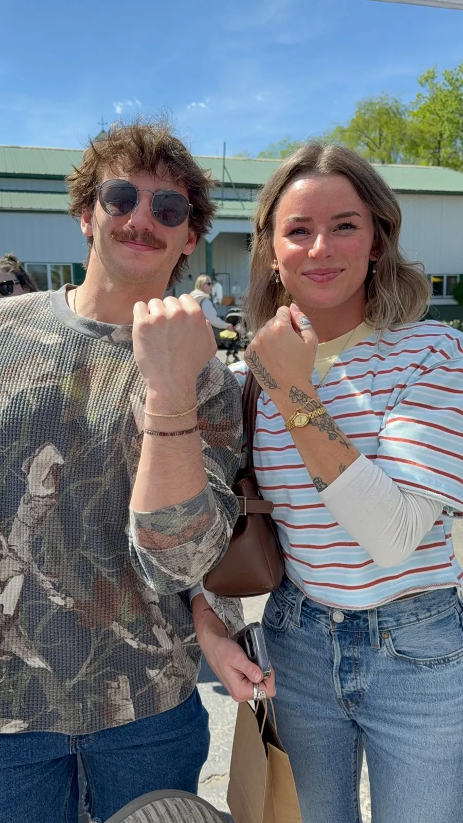 Couple with matching permanent jewelry