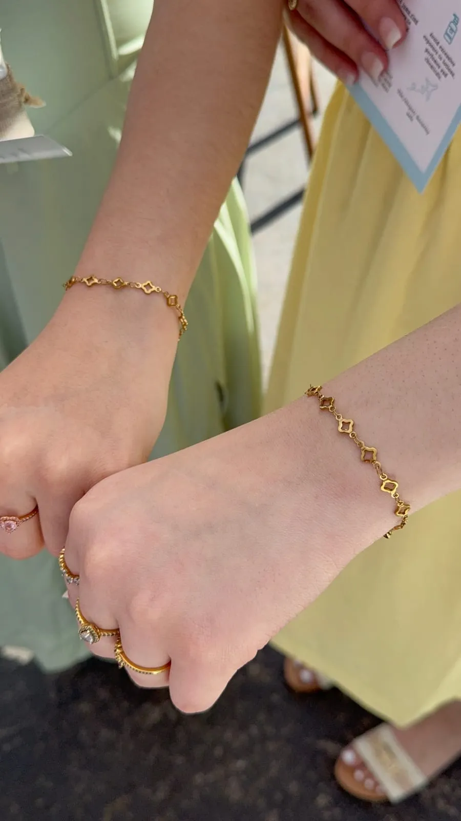 Friends with matching permanent jewelry
