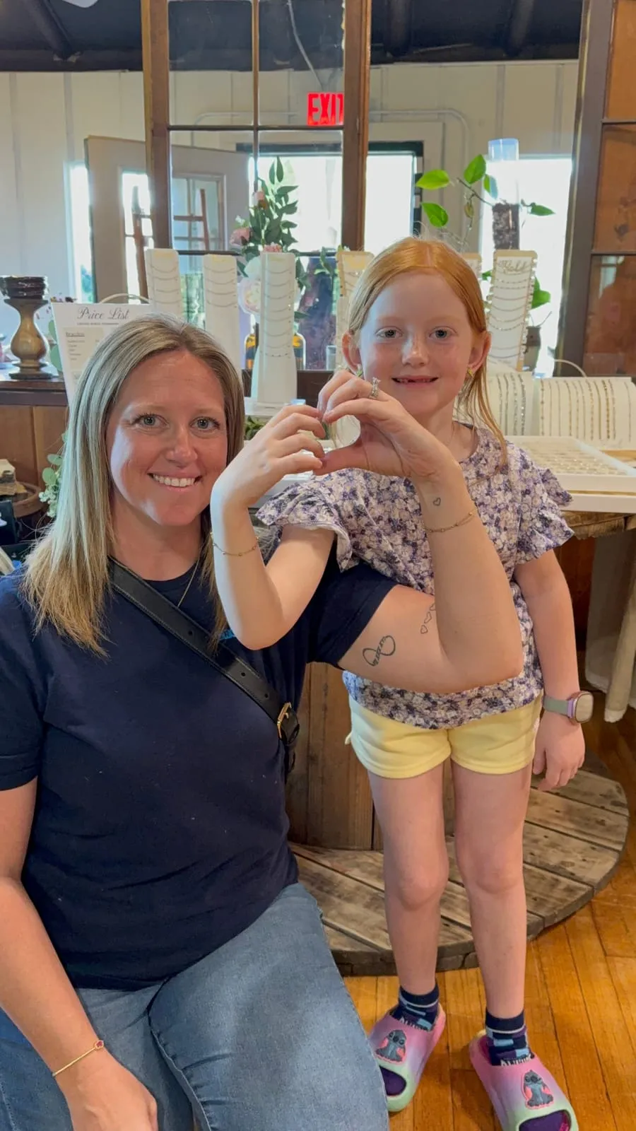 Mother and daughter with matching permanent jewelry