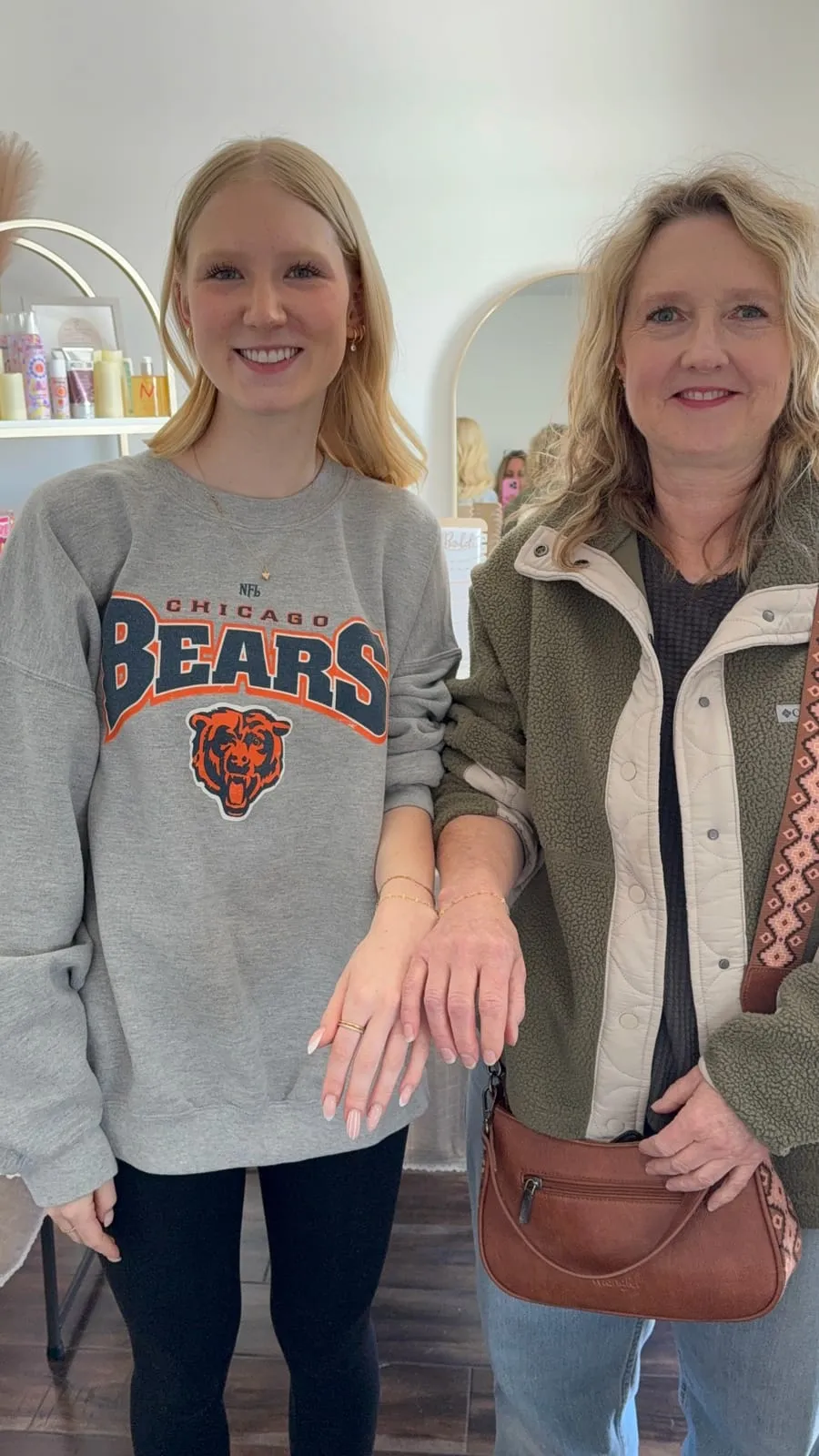 Mother and daughter with matching permanent jewelry