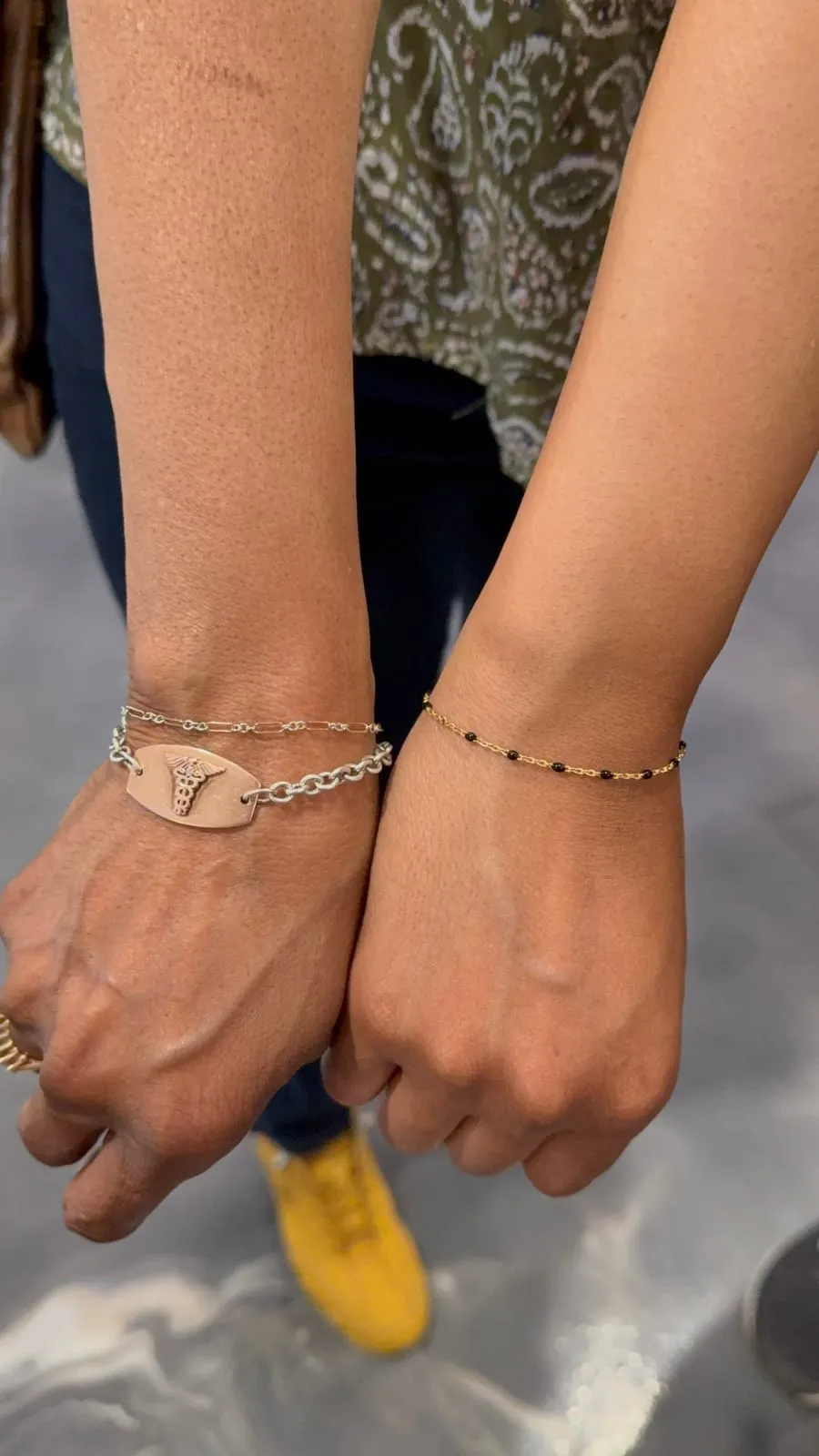Mother and daughter with matching permanent jewelry