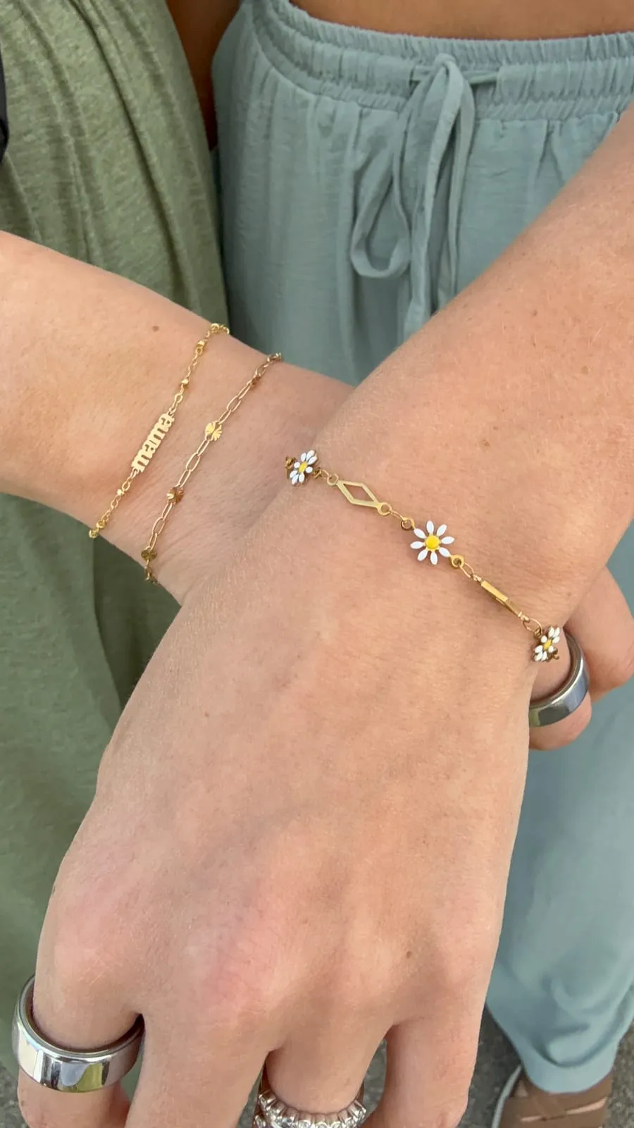 Friends with matching permanent jewelry