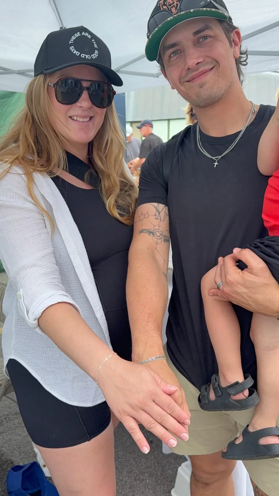Couple with matching permanent jewelry